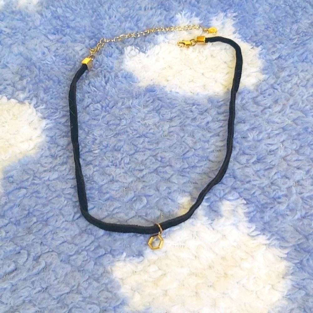 Black and gold choker.